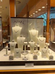 Photo of WARSAW, POLAND - JULY 17, 2022: Showcase with beautiful jewelry of Apart store in shopping mall