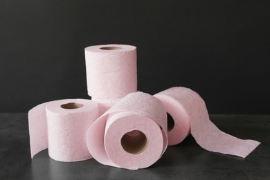 Soft toilet paper rolls on black background