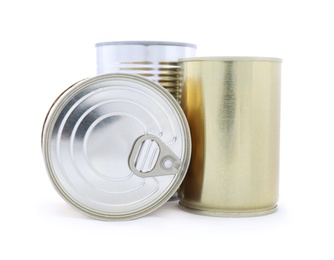 Closed metal tin cans on white background