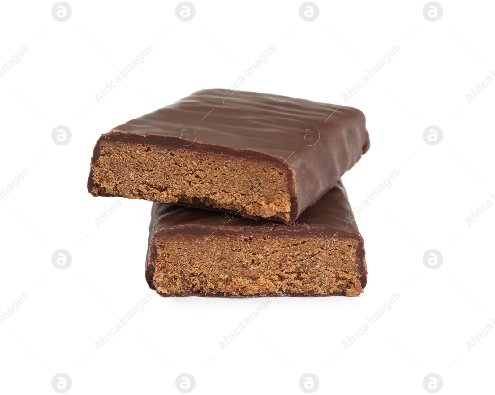 Photo of Halves of tasty chocolate glazed protein bar on white background