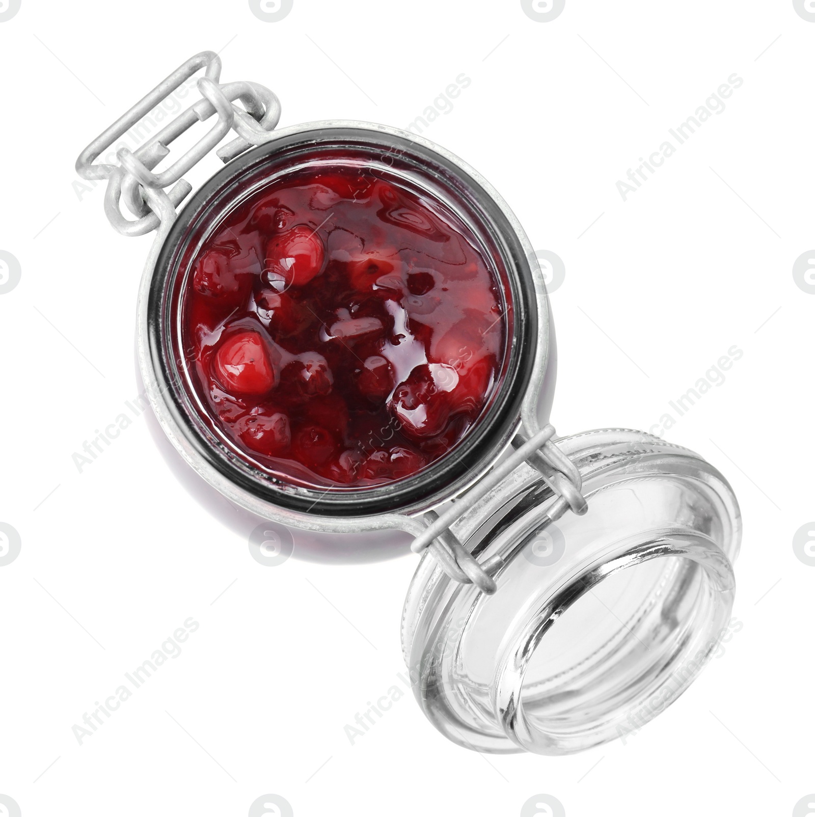 Photo of Fresh cranberry sauce in glass jar isolated on white, top view