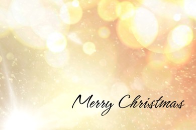 Image of Greeting card with phrase Merry Christmas on background with golden blurred lights