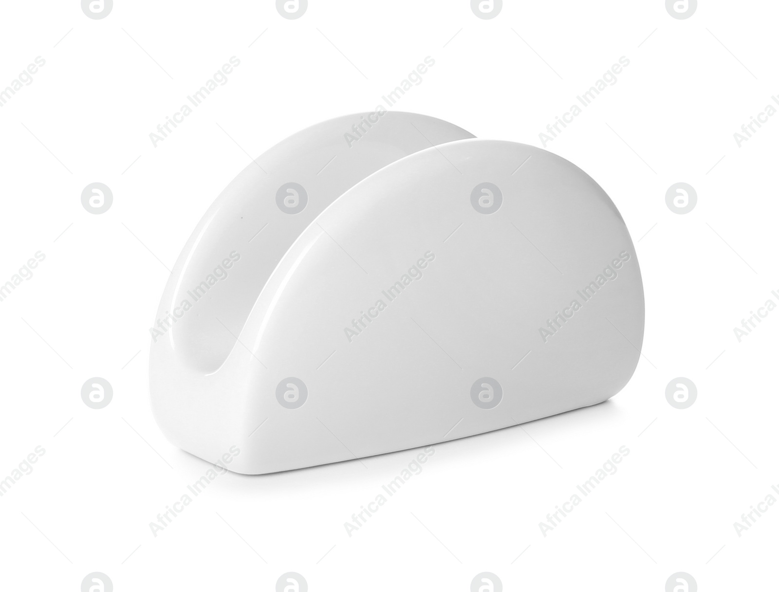 Photo of Empty ceramic napkin holder on white background