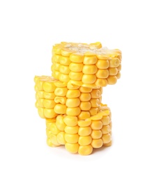 Photo of Pieces of ripe raw corn cob on white background