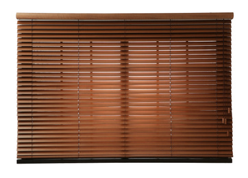 Modern window with closed blinds on white background