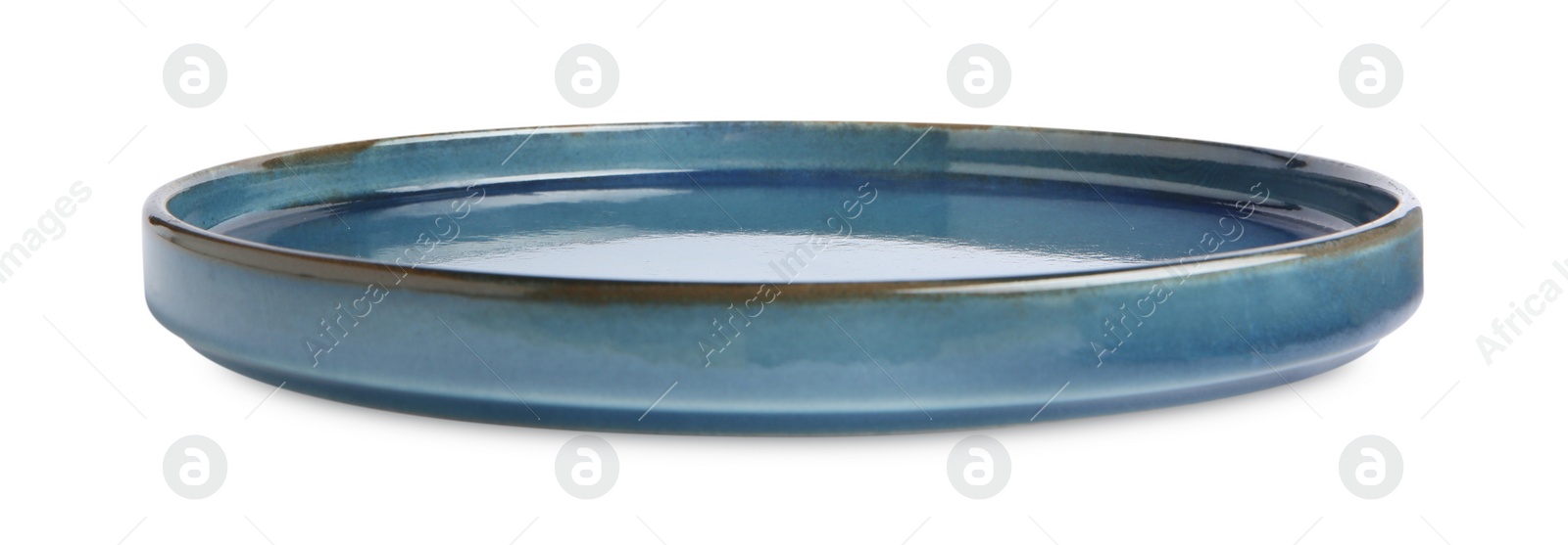 Photo of Beautiful blue ceramic plate isolated on white