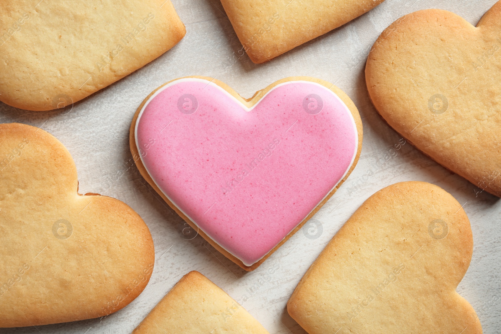 Photo of Homemade heart shaped cookies on table, top view