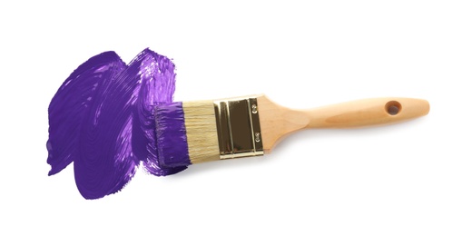 Photo of Brush with purple paint on white background, top view