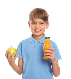 Little boy with bottle of juice and apple on white background. Healthy food for school lunch