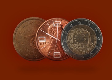 Image of Time is money. Coins and illustration of clock on dark red background