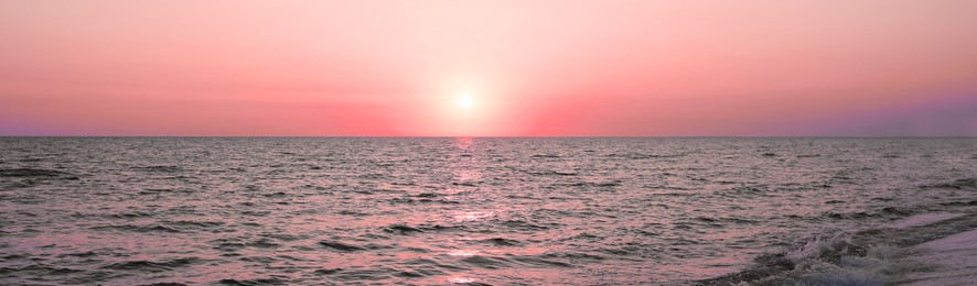 Image of Beautiful panorama of sky over sea at sunset. Banner design