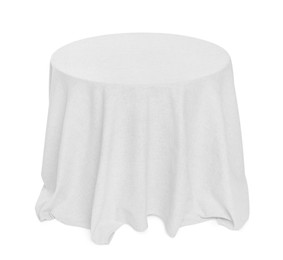 Photo of Table with white tablecloth isolated on white