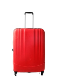 Photo of Bright red suitcase packed for journey on white background