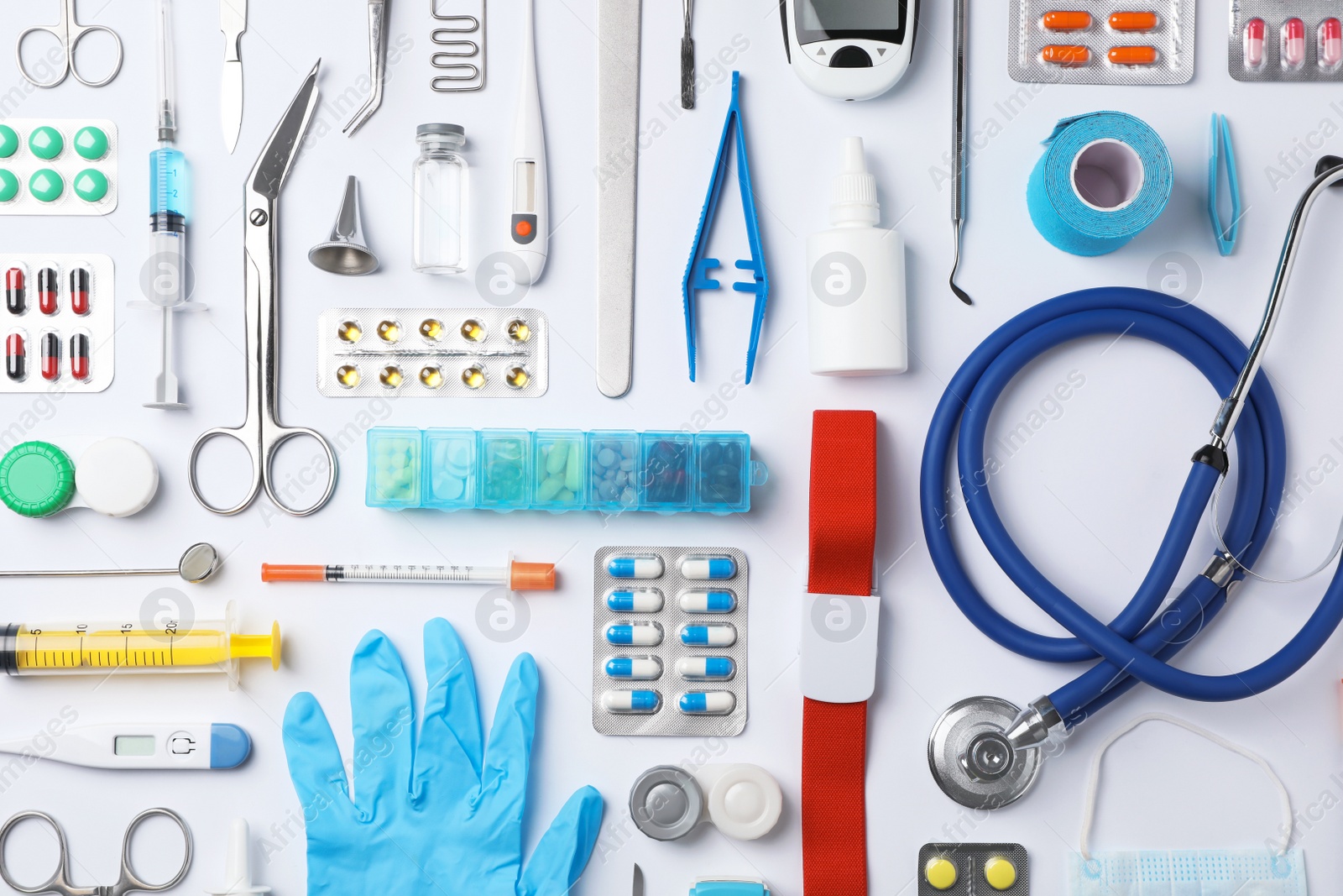 Photo of Flat lay composition with medical objects on white background