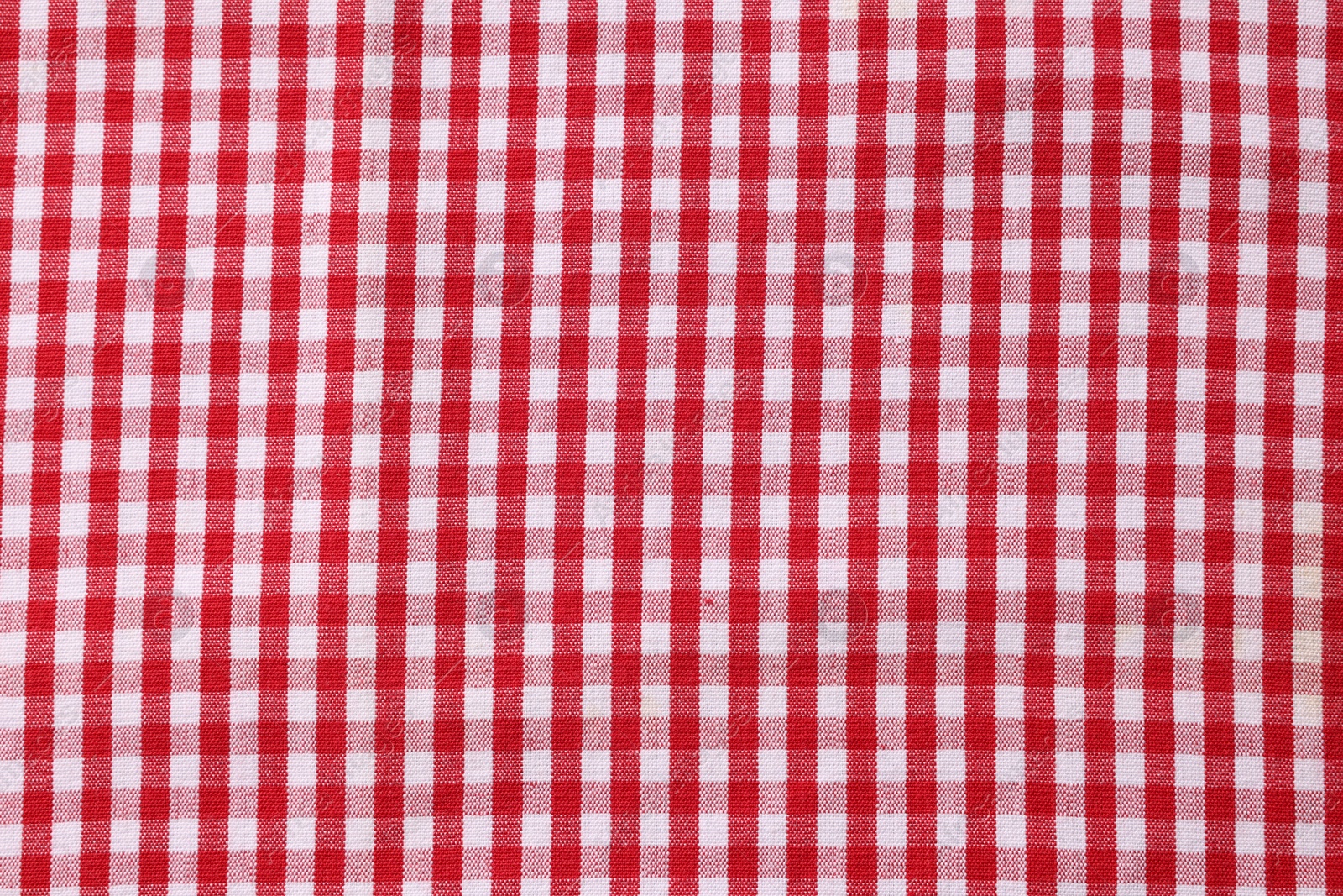 Photo of Red checkered tablecloth as background, top view