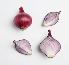 Photo of Beautiful composition with ripe red onions on white background