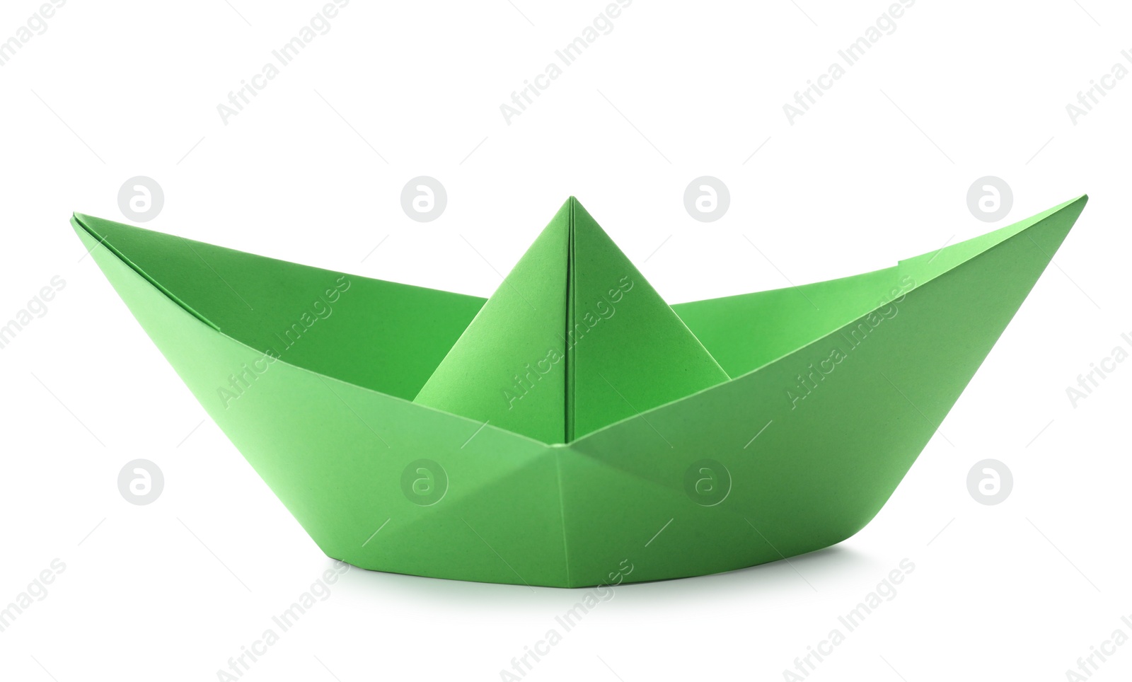 Photo of Handmade green paper boat isolated on white. Origami art