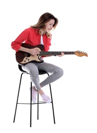 Young woman playing electric guitar on white background