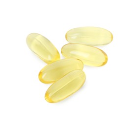 Photo of Vitamin capsules isolated on white. Health supplement