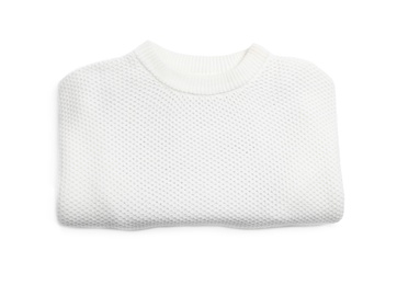 Folded knitted sweater on white background, top view