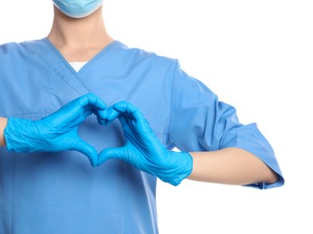 Photo of Doctor showing heart on white background, closeup