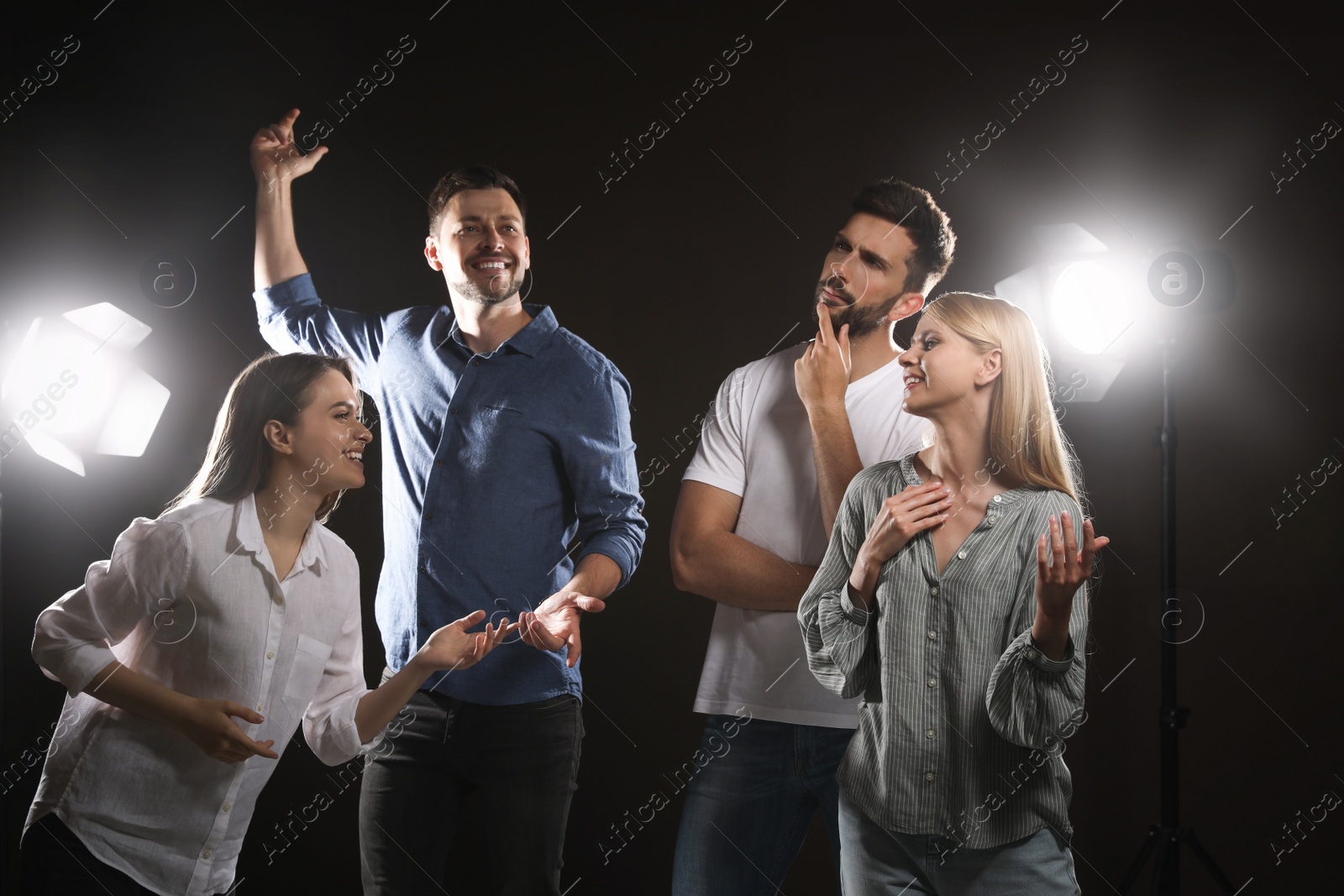 Photo of Professional actors rehearsing on stage in theatre