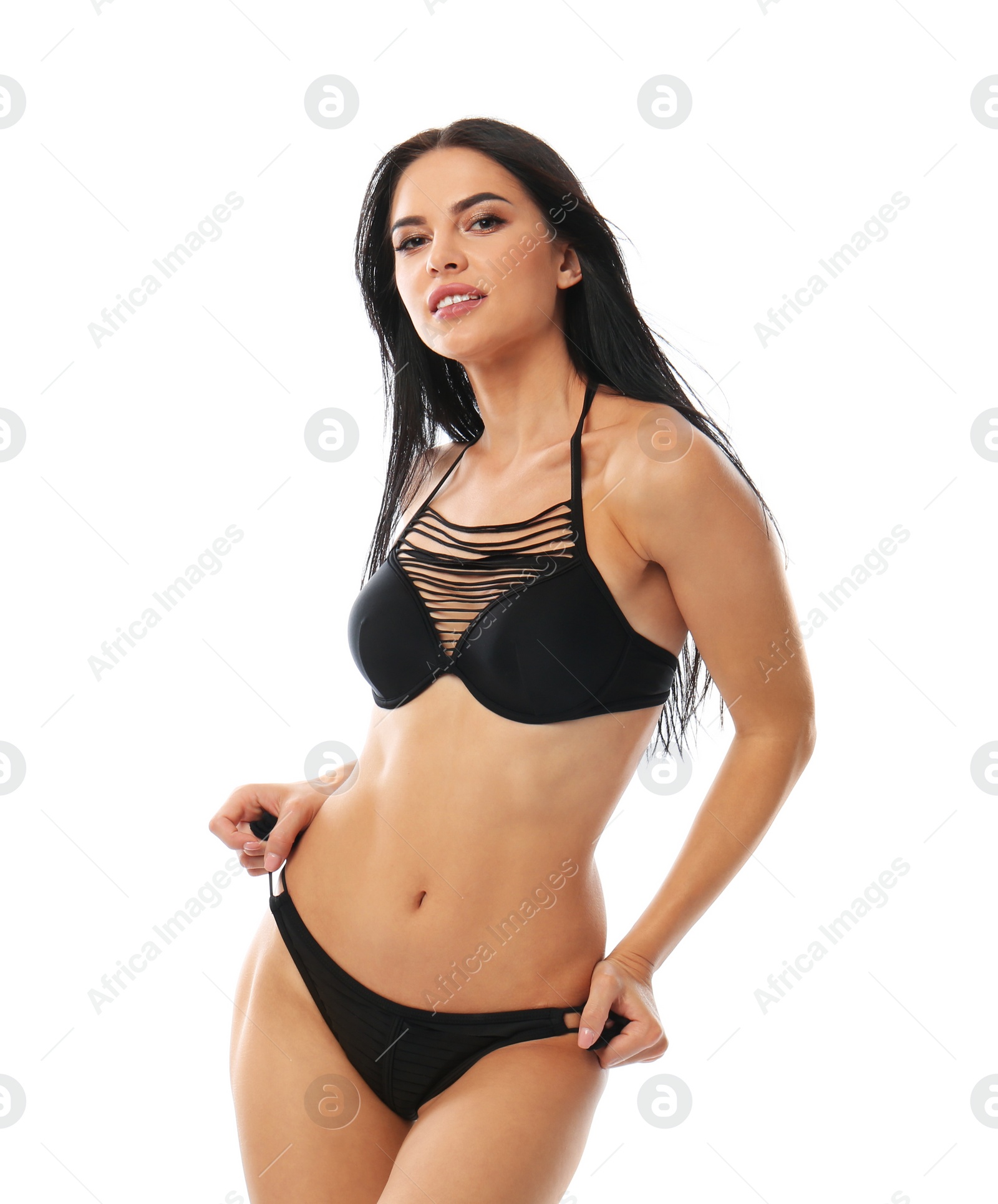 Photo of Beautiful young woman in black bikini on white background