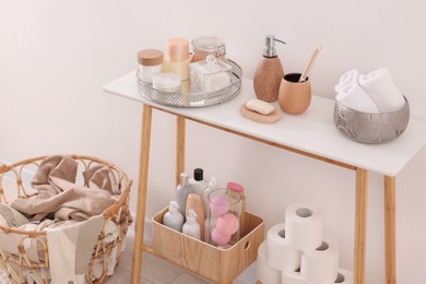 Different bath accessories and personal care products indoors