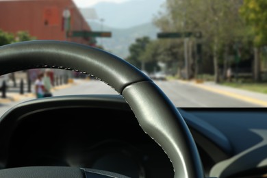 Image of Steering wheel inside of modern car, closeup