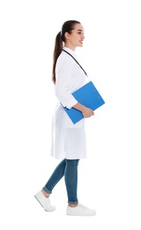 Photo of Full length portrait of medical doctor with clipboard and stethoscope isolated on white