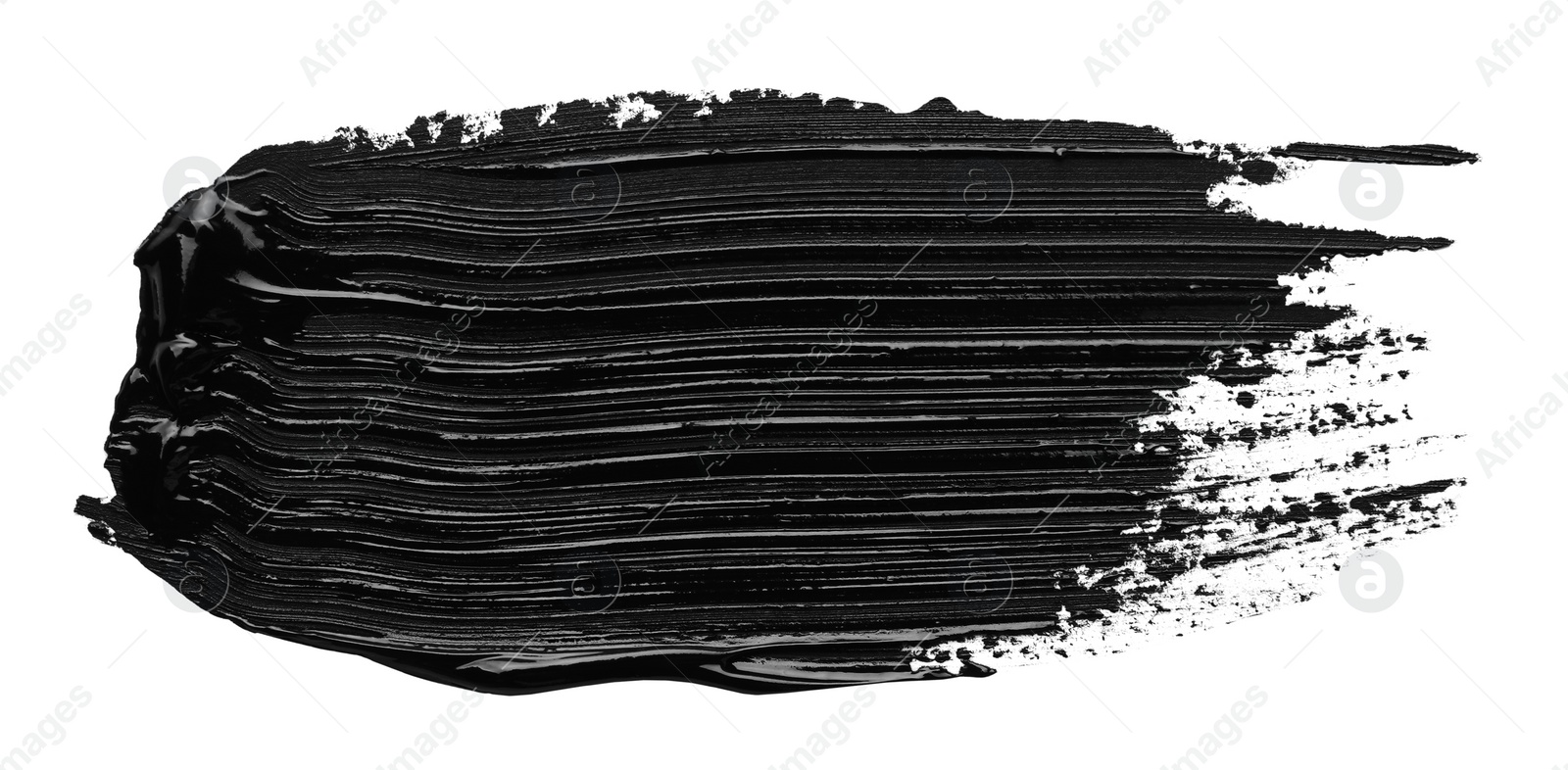 Photo of Brushstrokes of black oil paint on white background, top view