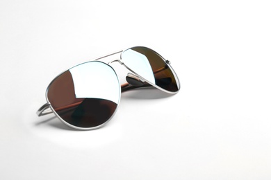 Stylish sunglasses on white background. Fashionable accessory