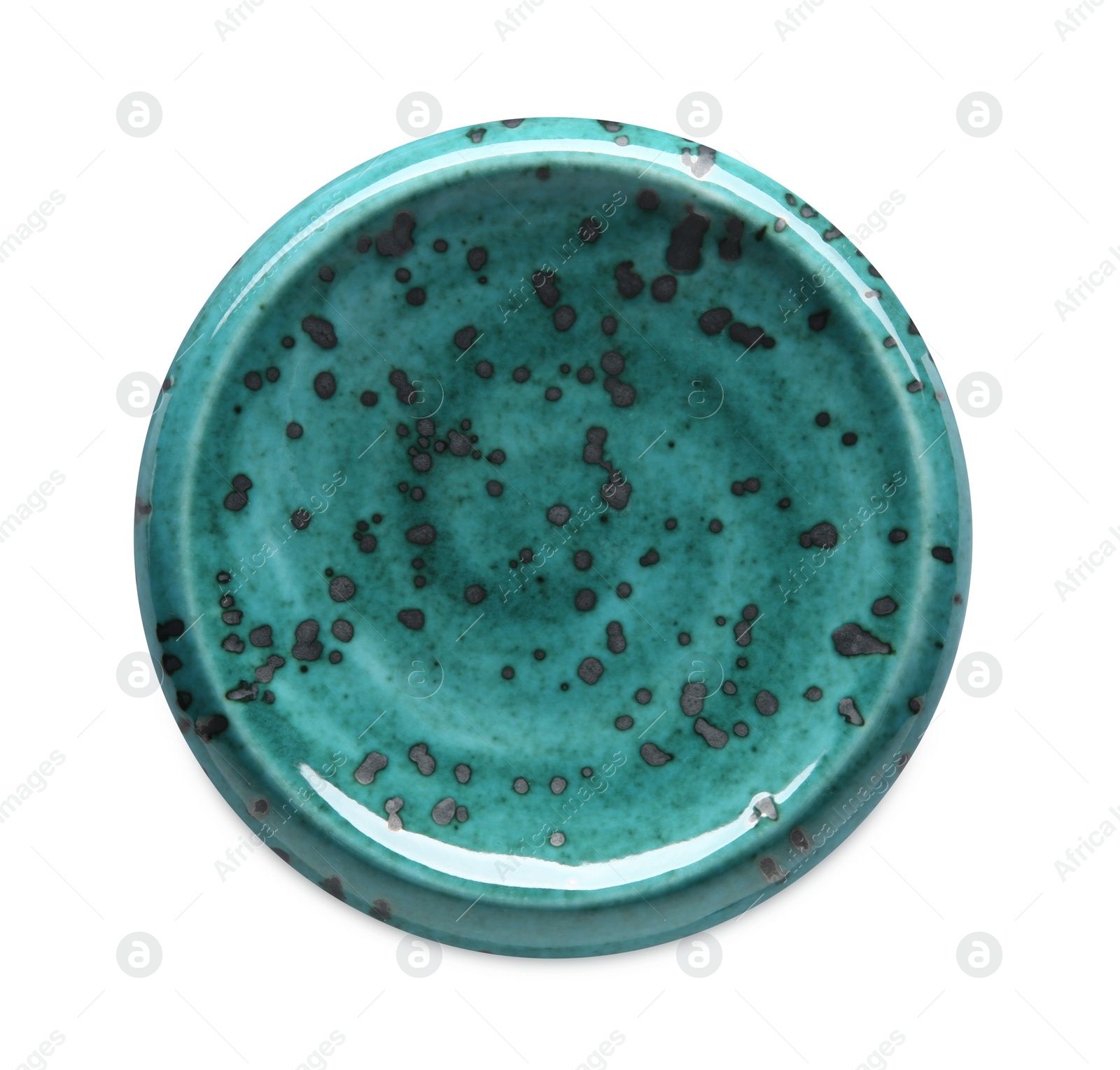 Photo of Turquoise ceramic plate isolated on white, top view