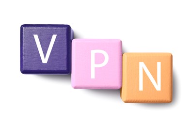 Photo of Colorful cubes with acronym VPN on white background, top view