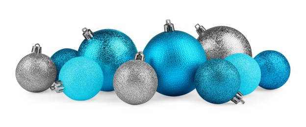 Photo of Beautiful silver and light blue Christmas balls isolated on white