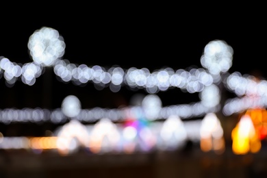 Photo of Beautiful street lights at night. Bokeh effect