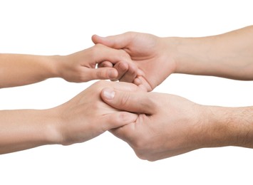 Photo of Man and woman holding hands together on white background, closeup