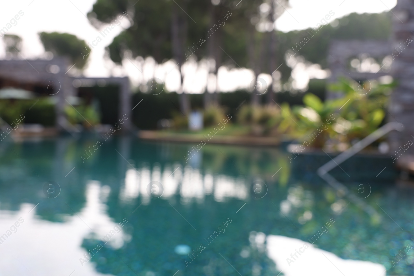 Photo of Blurred view of outdoor swimming pool at luxury resort