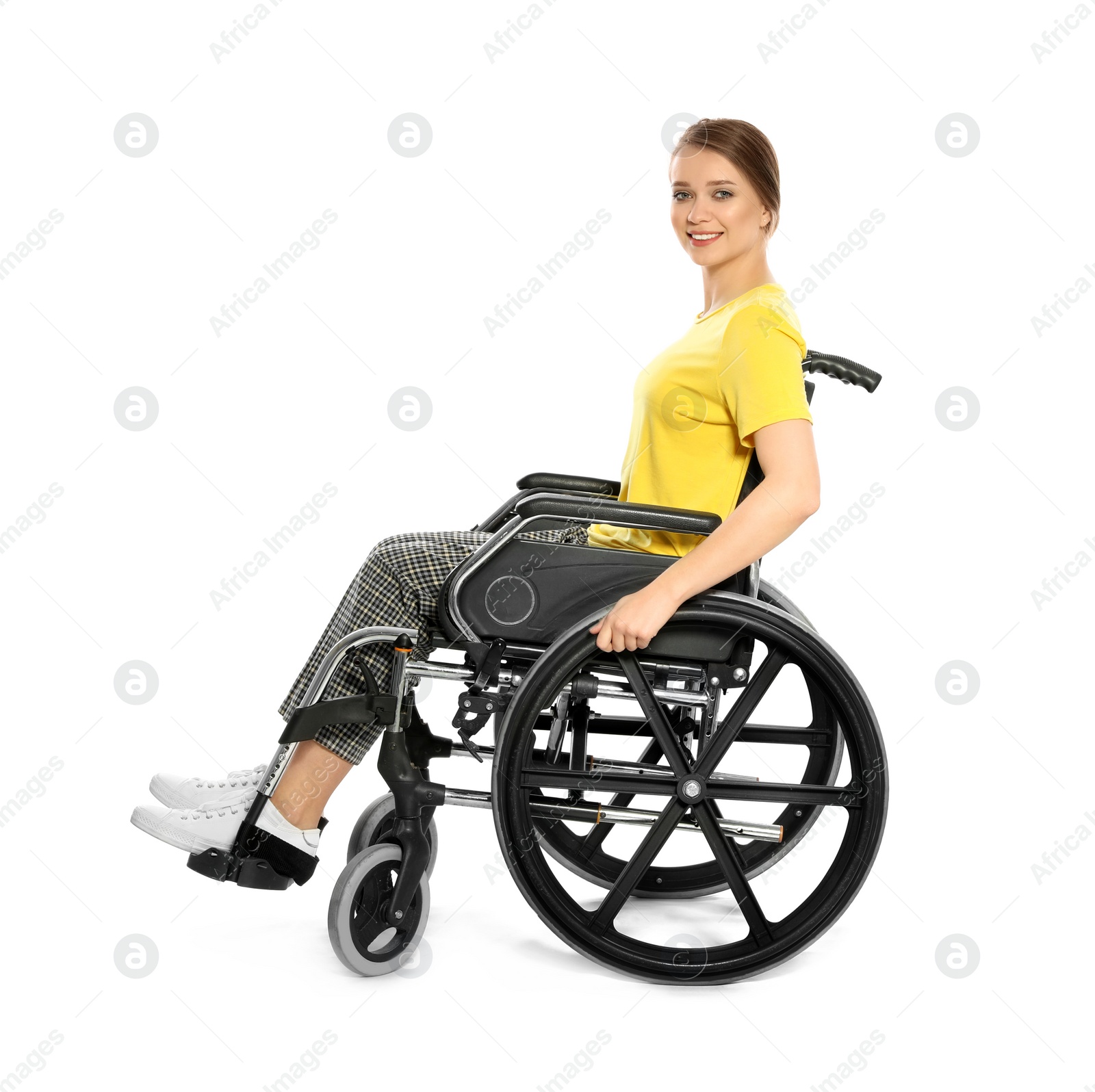 Photo of Portrait of beautiful woman in wheelchair isolated on white