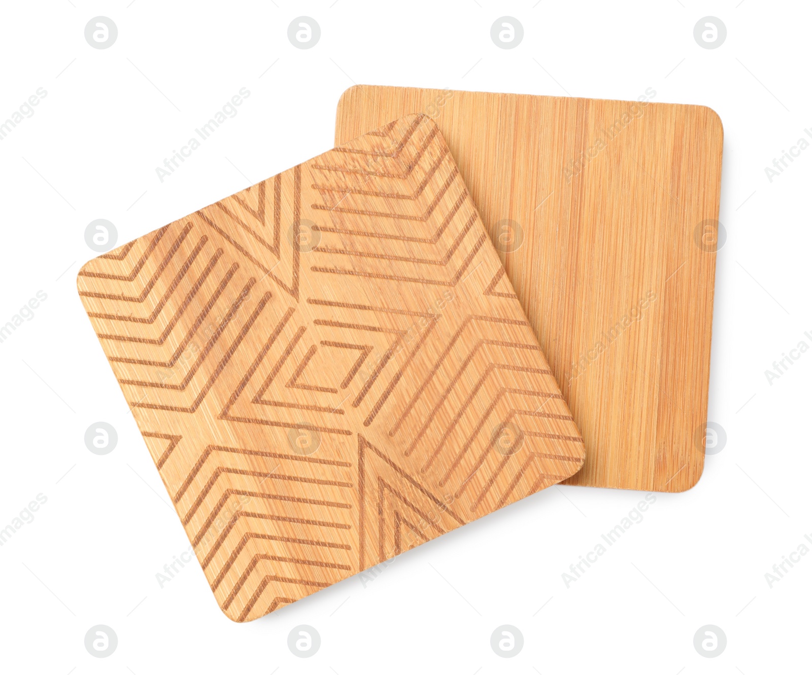 Photo of Stylish wooden cup coasters on white background, top view