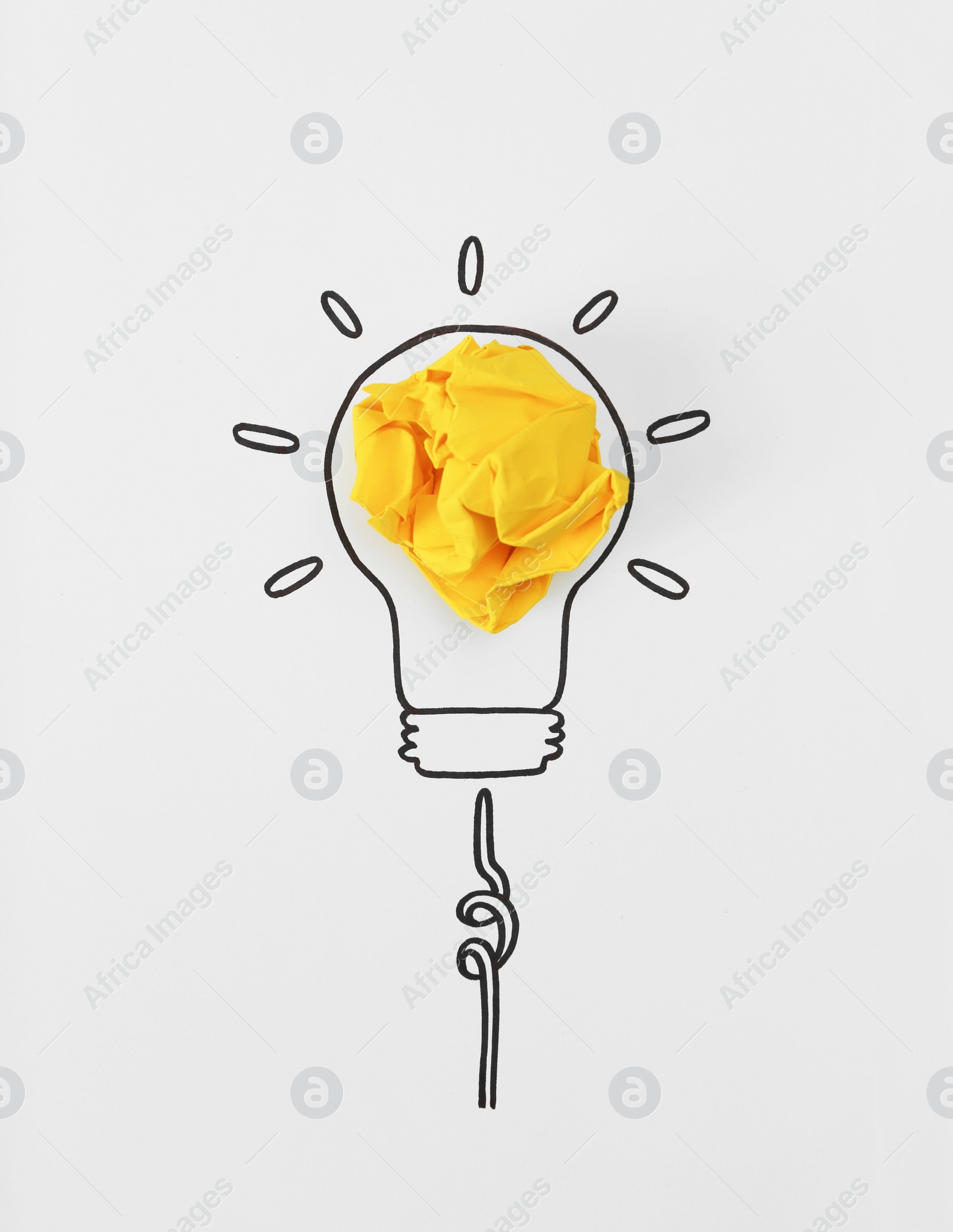 Photo of Composition with crumpled paper ball and drawing of lamp bulb on white background, top view. Creative concept