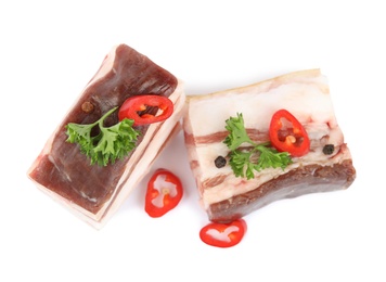 Photo of Bacon with parsley and chili pepper isolated on white, top view