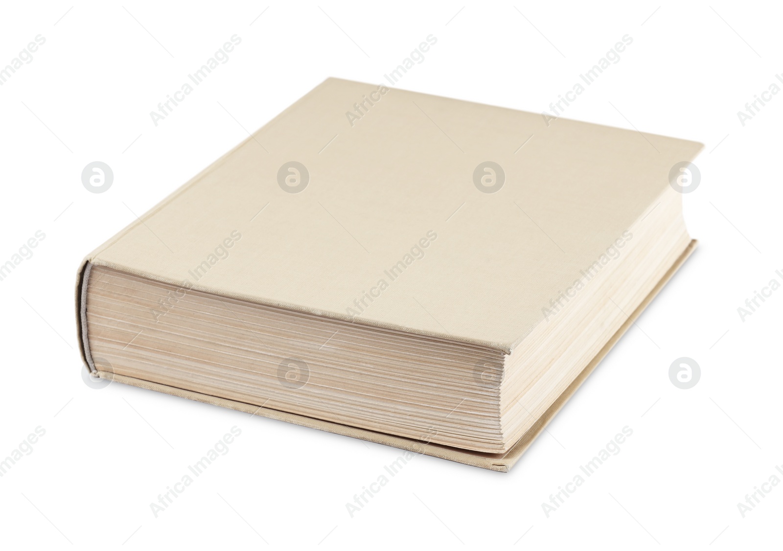 Photo of One closed beige hardcover book isolated on white