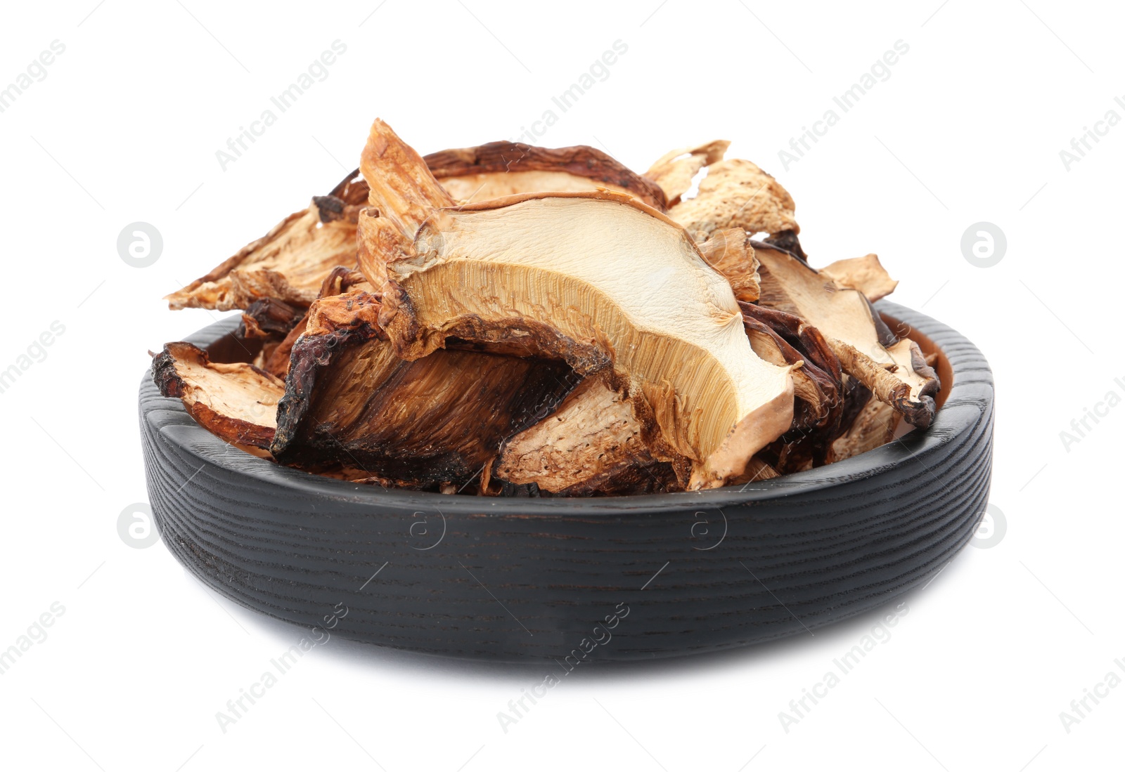 Photo of Plate of tasty dried mushrooms isolated on white