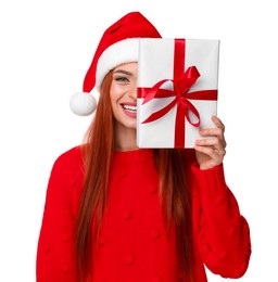 Photo of Young woman in red sweater and Santa hat with Christmas gift on white background