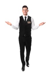 Photo of Full length portrait of happy receptionist in uniform on white background