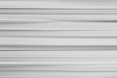 Photo of Stack of white paper sheets, closeup view