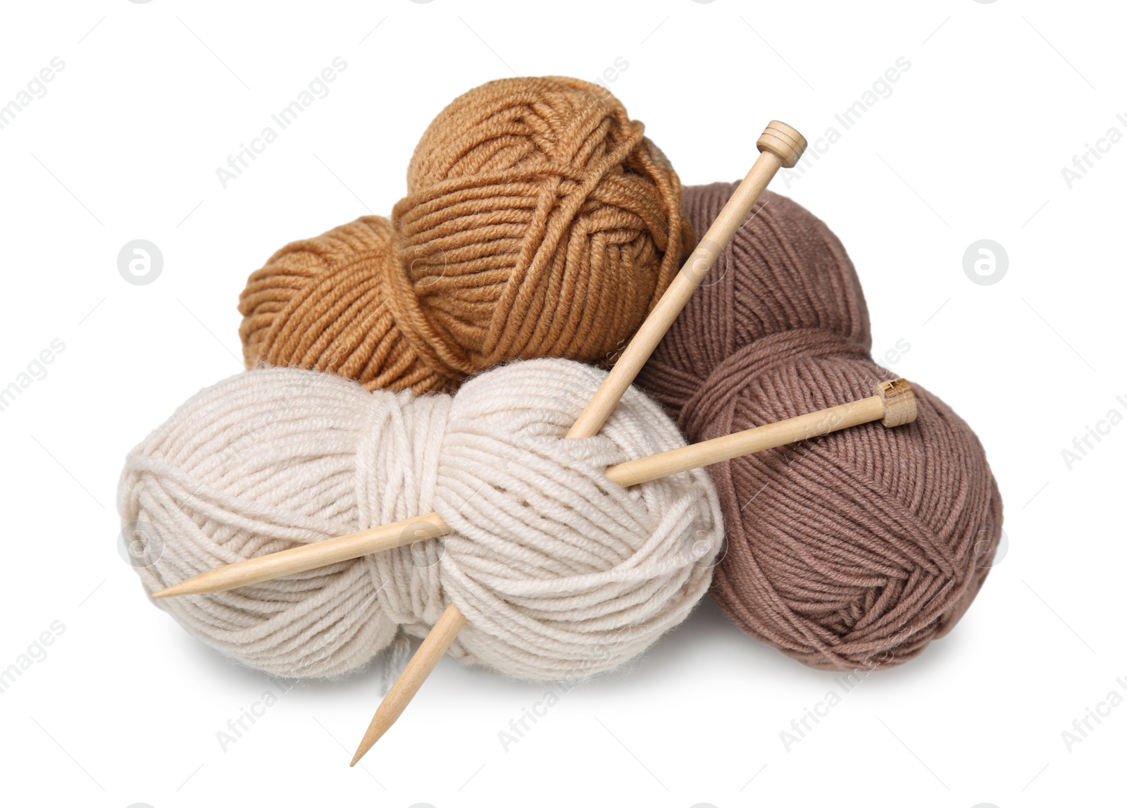 Photo of Soft woolen yarns and knitting needles on white background