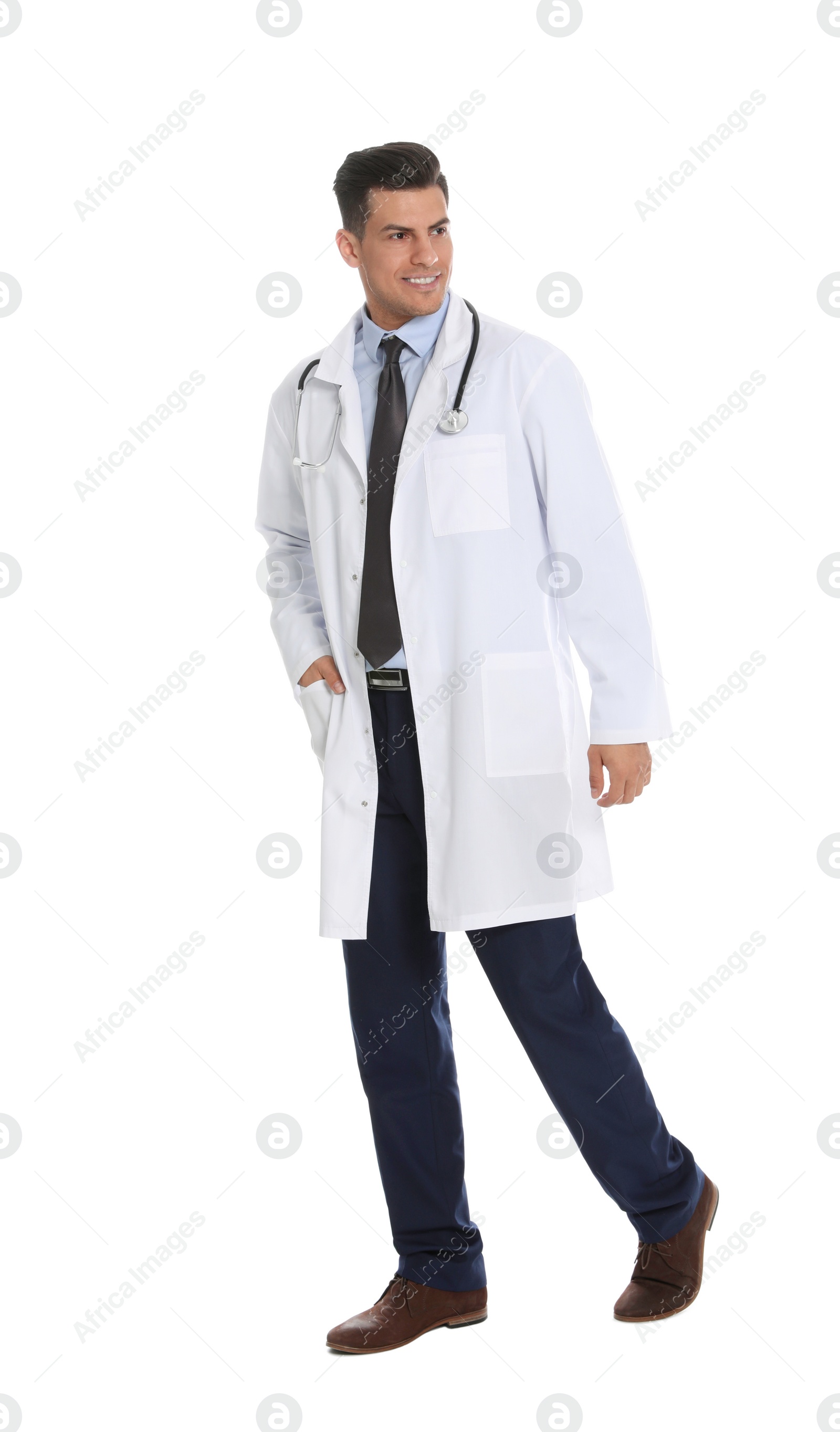 Photo of Full length portrait of medical doctor with stethoscope isolated on white