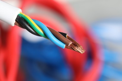 Colorful electrical wire on blurred background, closeup